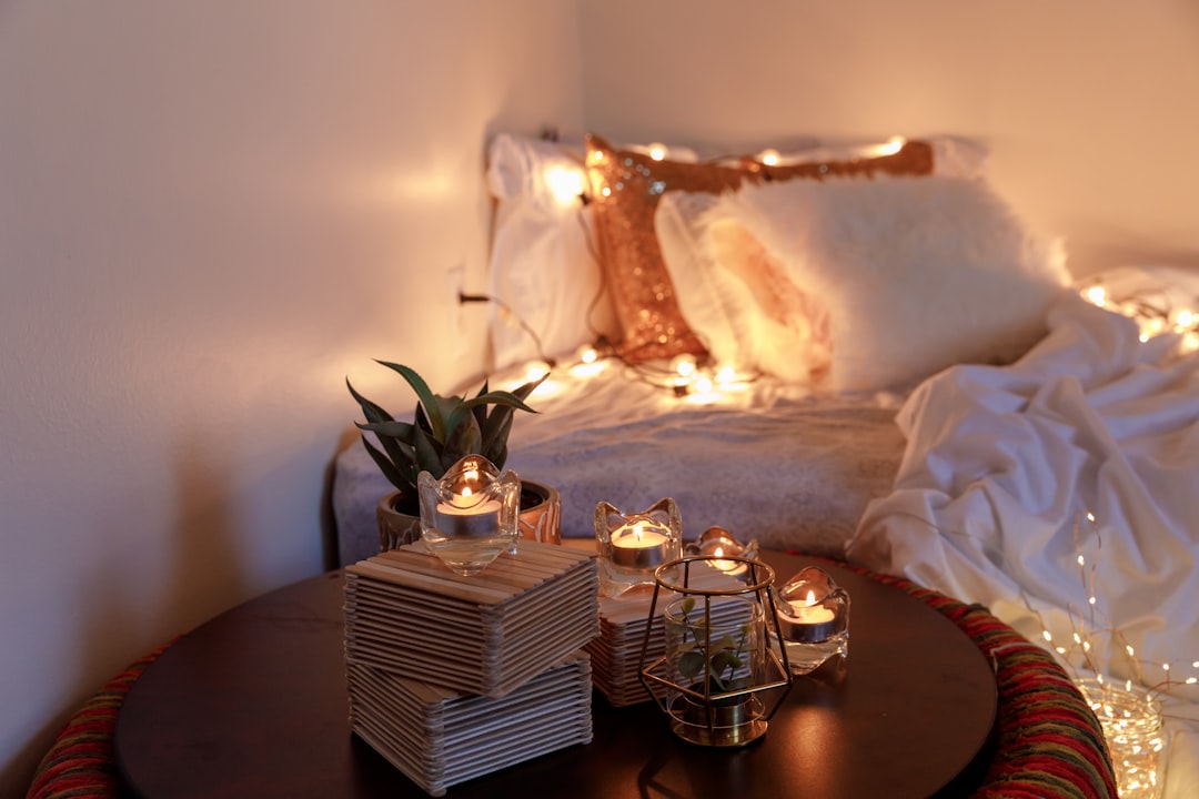A cosy at-home proposal with candles and fairy lights
